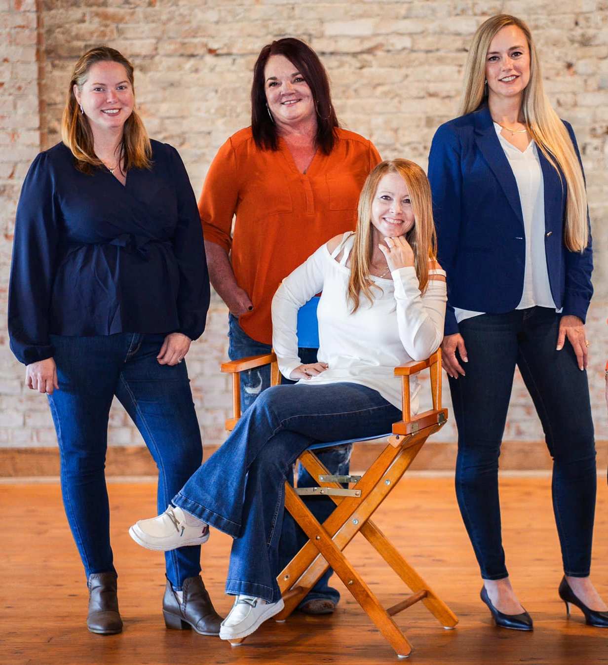 864 Realty LLC agents standing together in a professional team photo
